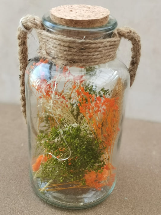 Dry flowers in jar